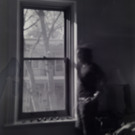 pinhole-roy-at-window